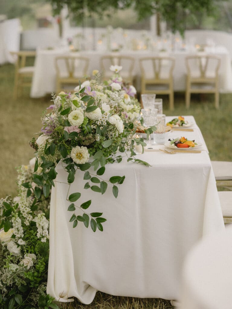 Floral installation and reception table details at a Greystone Castle wedding in Boulder, Colorado